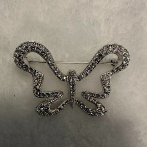 Very pretty! Swarovski butterfly brooch.